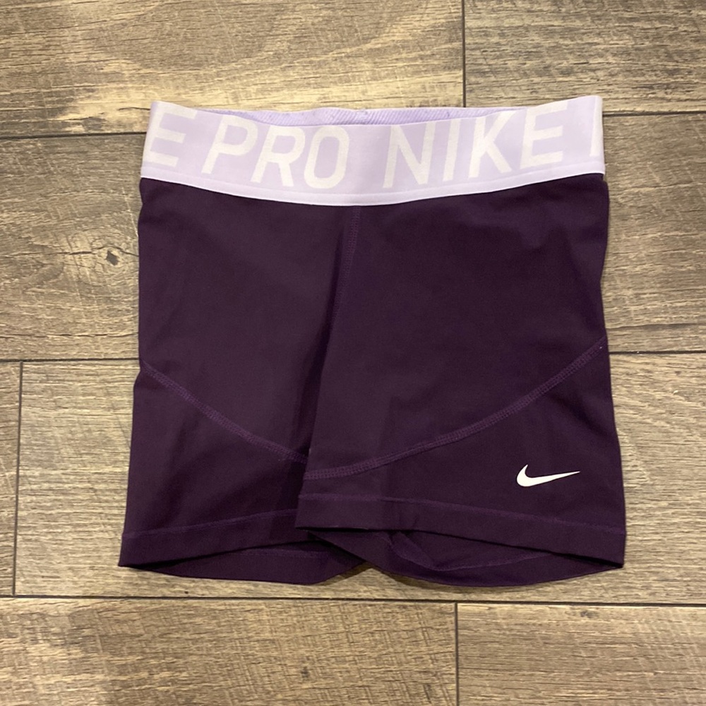 small purple womens nike pros